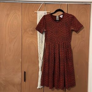 Medium lula roe dress. Well worn but in good shape. Note the deodorant marks.